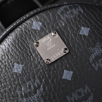 MCM Stark Visetos Medium Backpack – Black Monogram with Studded Detailing