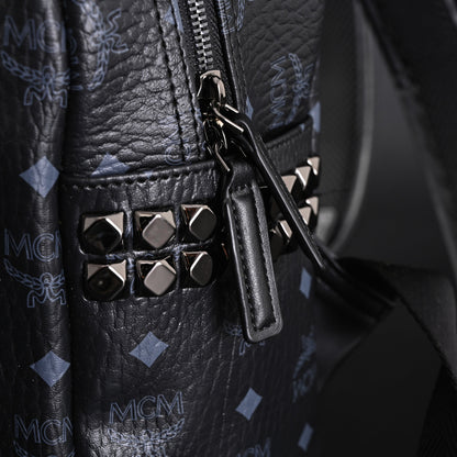 MCM Stark Visetos Medium Backpack – Black Monogram with Studded Detailing