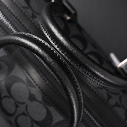 Coach Signature Duffel Bag – Black Monogram Canvas with Leather Trim